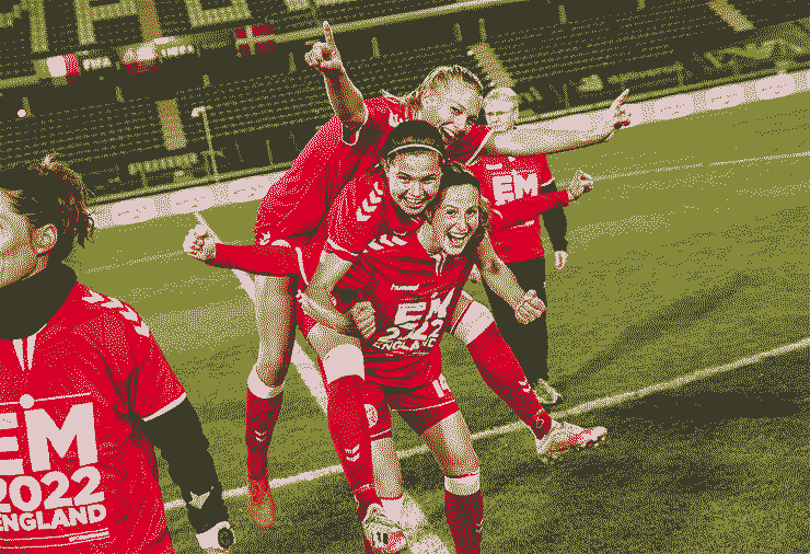 A picture of Nicoline Sørensen celebrating with her teammates.